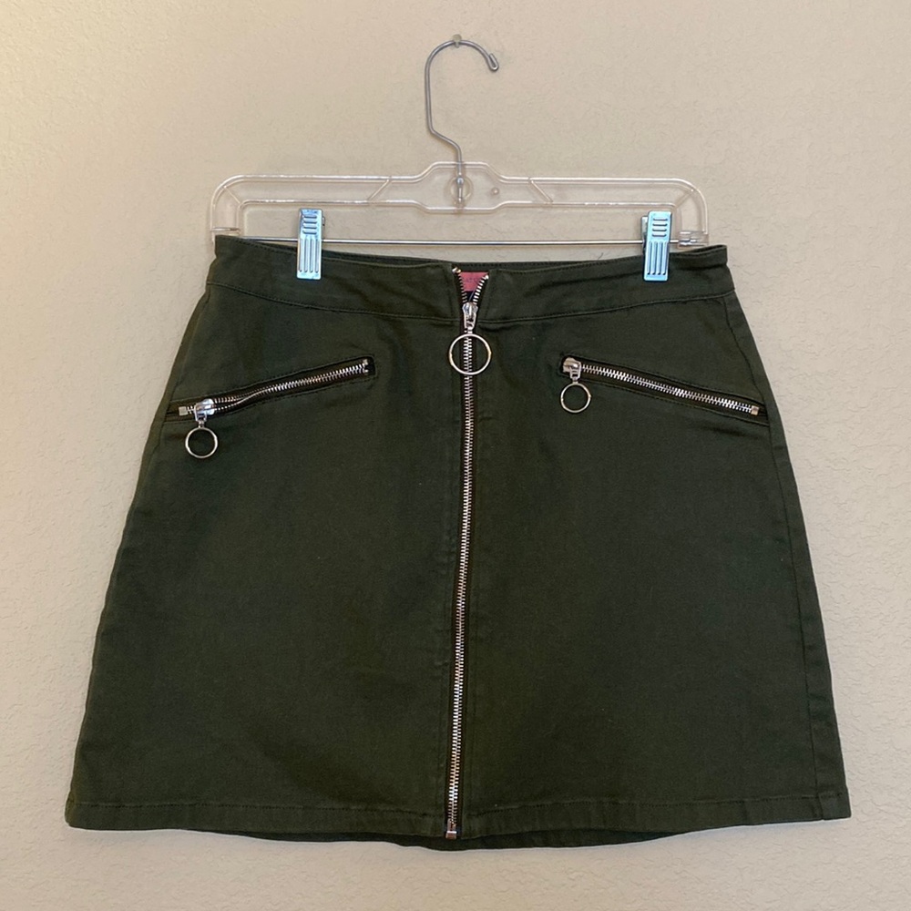 Dark green mini skirt